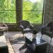 Remodel Your Porch into a Three-Season Sun Room with Faux Stone Panels